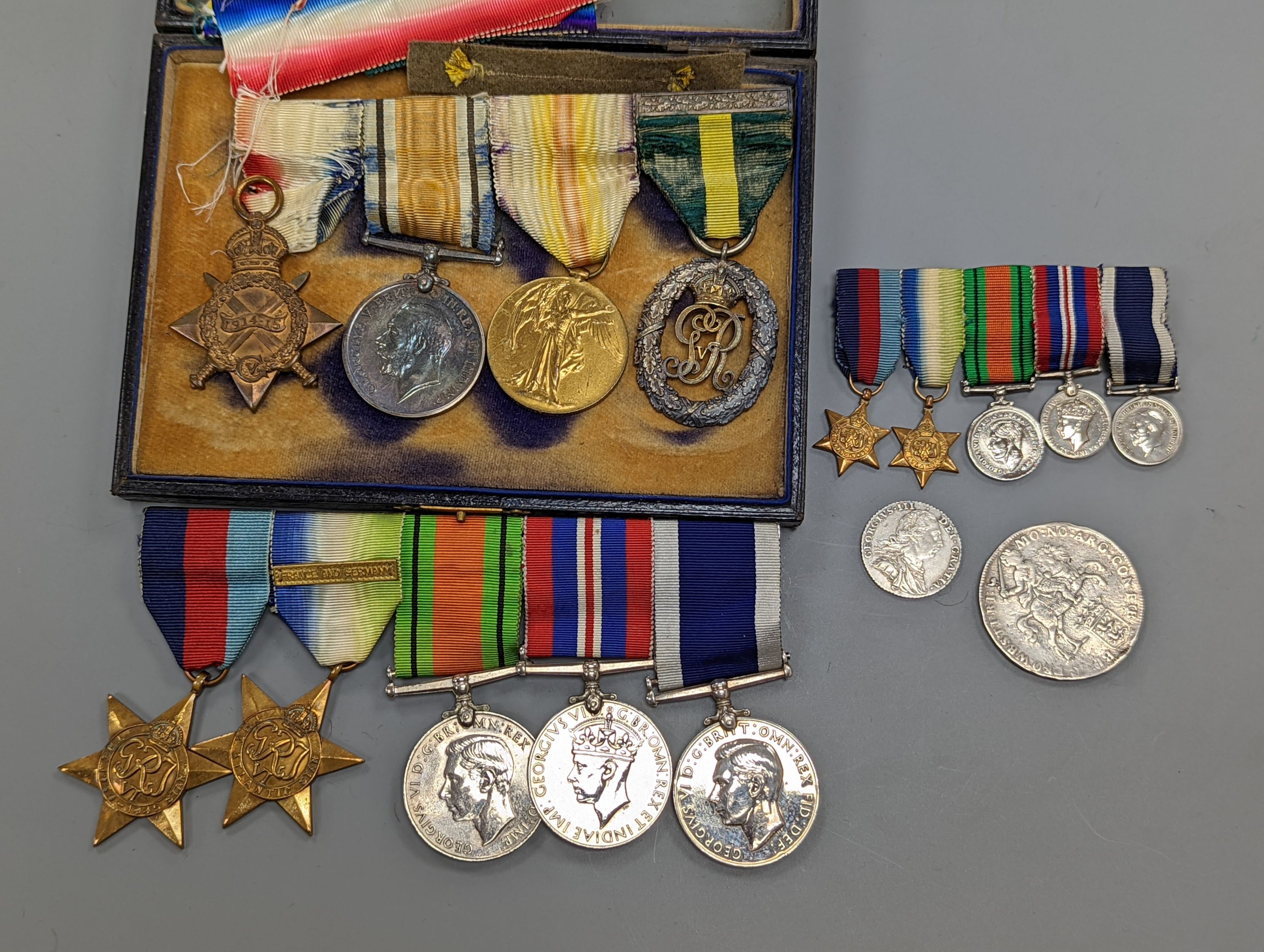 A WW1 group of four to MAJOR H. L. GREGORY R.A.M.C. and a WW2 Royal Navy group of five medals, including Royal Navy for long service and good conduct medal, unnamed, together with a 1787 shilling, good VF and another coi